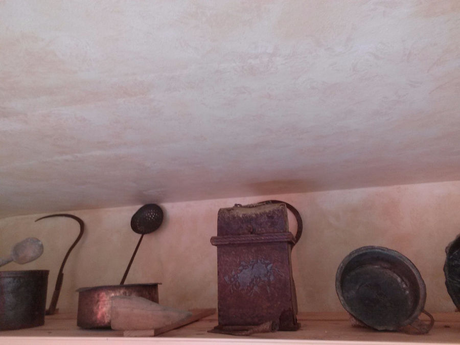 old copper saucepans at 'Piperis Winery' exhibition area